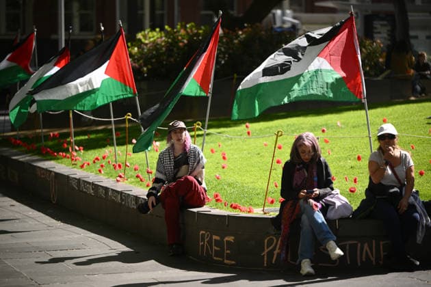 PRO-PALESTINE VIGIL, Pro-Palestine protestors hold a vigil for Gaza at the State Library Victoria in Melbourne, Wednesday, October 7, 2026. ( NO ARCHIVING MELBOURNE VICTORIA Australia  Copyright: xJOELxCARRETTx 20261007193702181446