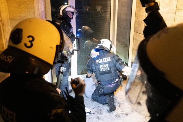 October 7, 2026, Cologne, Nrw, Germany: Multiple hundreds of people took part in a demonstration in Cologne marking the third anniversary of October 7, 2023, protesting IsraelÃ¢â‚¬â ¢s military campaign and genocidal intervention in Gaza. A smaller counter-protest took place without reported confrontations between the two groups...Police intervened and stopped the demonstration multiple times before protesters were held inside a police cage for approximately two hours. Officers later opened a corridor and allowed them to leave in small groups. During the dispersal, police arrested around 10 protesters, who were later released from custody. Cologne Germany  - ZUMAm356 20261007_zip_m356_006 Copyright: xMouafakxMahmaljix