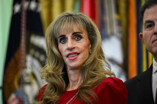 WASHINGTON, DC - OCT. 7: Susan Dell, wife of Dell Technologies CEO Michael Dell, listens as US President Donald J Trump speaks during an announcement on Trump Accounts in the Oval Office of the White House in Washington, DC, USA, on Wednesday, October 7, 2026. Copyright: xAnnabellexGordon PoolxviaxCNPx MediaPunchx