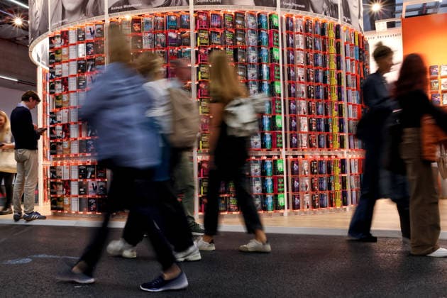 October 8, 2026, Frankfurt am Main, Germany, Visitors to the Frankfurt Book Fair walk past the Knaur booth