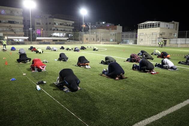Coronavirus in West Bank, Ramadan Night prayer on a football field in Jerusalem