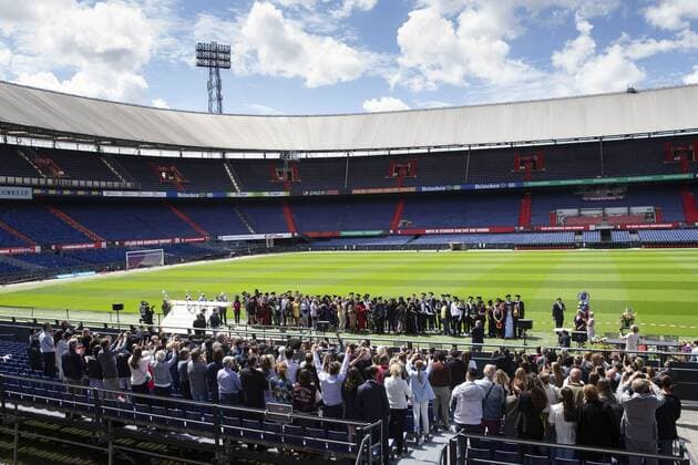 Rotterdam, diploma presentation for students at the De Kuip football stadium