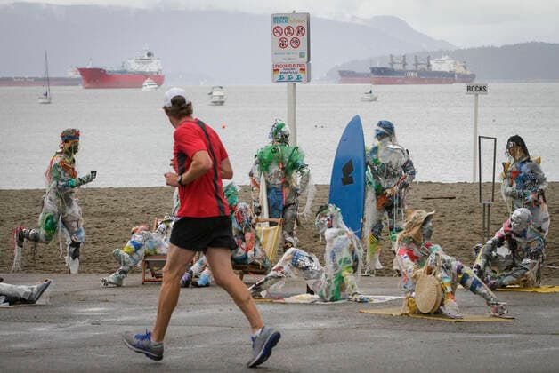 Canada, plastic figures on the beach of Vancouver