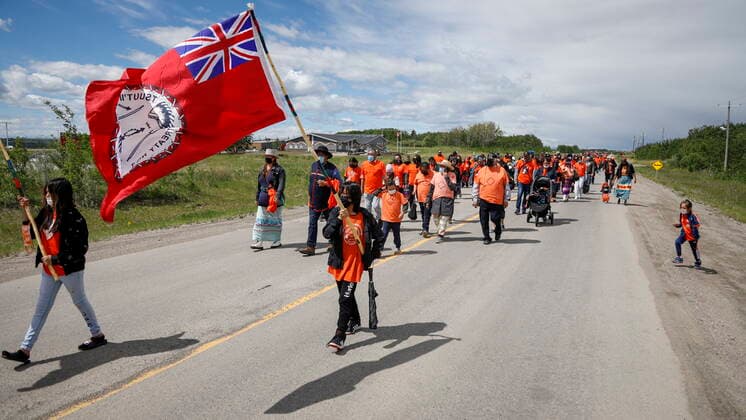Canada, Tsuut ina Nation silent march for 215 child bodies found at Kamloops boarding school