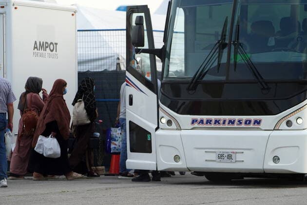 Canada, rescued from Kabul land in Toronto