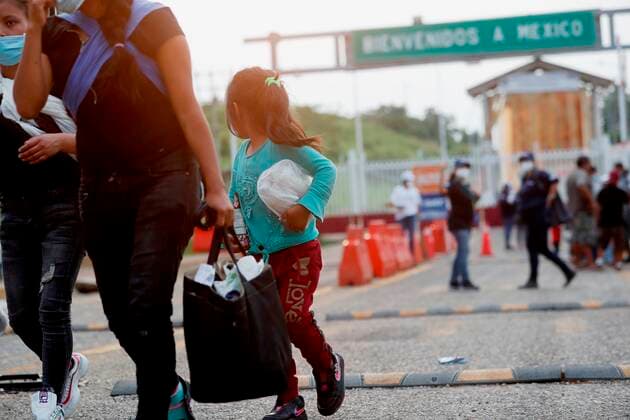 Guatemala, migrants at Mexico border after deportation from U.S.