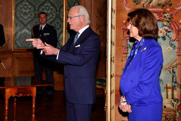 Swedish royal couple Carl Gustaf and Silvia award medals in Stockholm