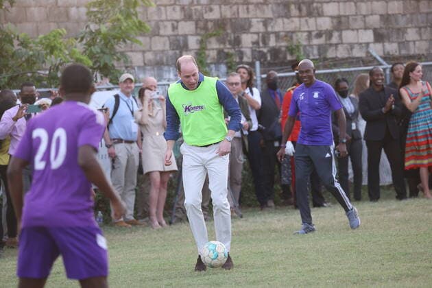 Prince William and Kate in Jamaica, visit to Trench Town - William plays football