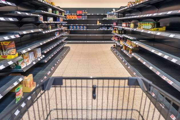 Supply bottlenecks cause gaps on supermarket shelves, archive images