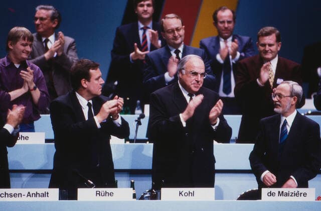 German parties, CDU, GDR bloc parties merge into the CDU in 1990