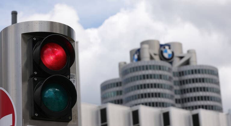 BMW plans massive job cuts, archive and stock images