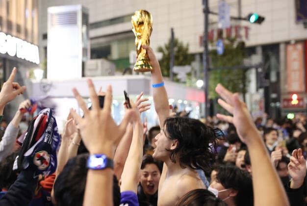 Japan, football fans celebrate victory in World Cup match against Germany in Tokyo