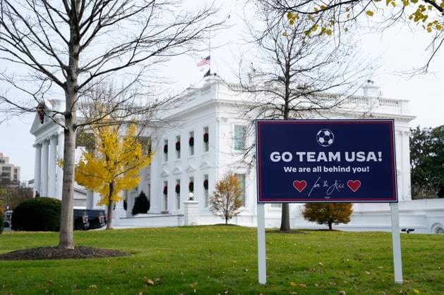 Washington, Go Team USA, sign in front of the White House for the World Cup football match against Iran