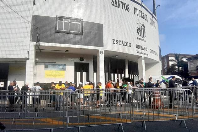 Sao Paulo, wake for football legend Pele, fans wait outside Santos FC stadium