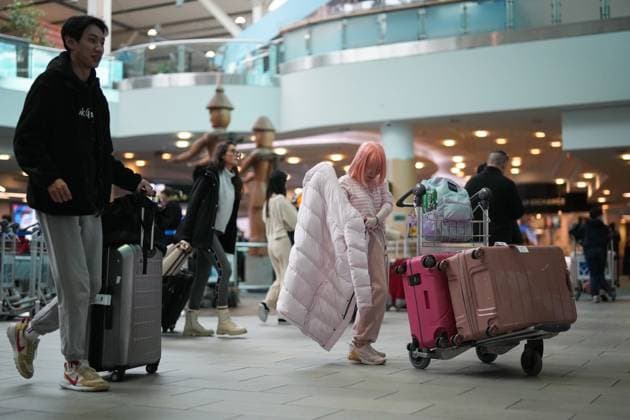 Canada, travellers from China at Vancouver Airport in Richmond