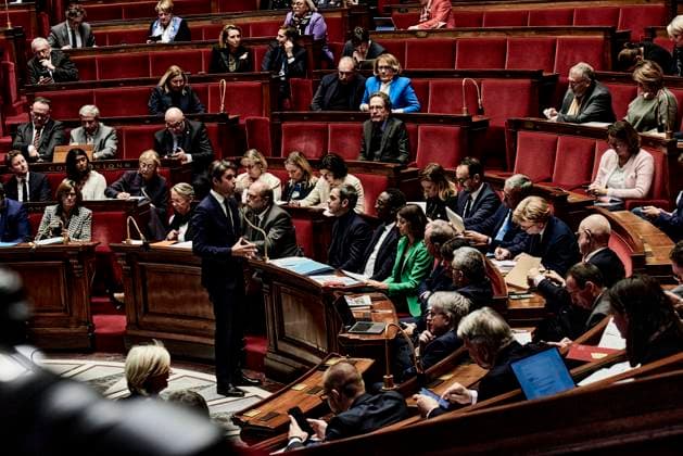 France passes controversial immigration law, archive images