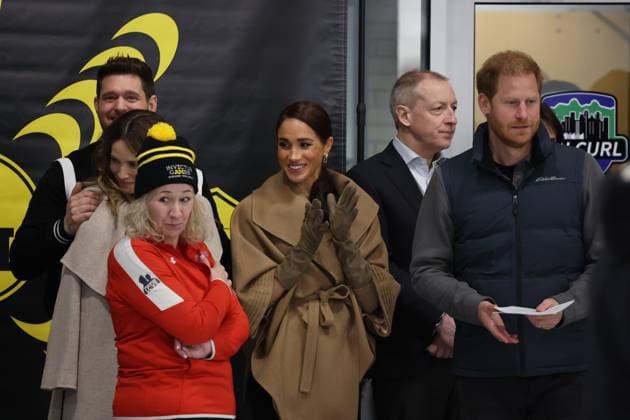 Prince Harry and Meghan Markle at the Curling Centre in Vancouver, Canada