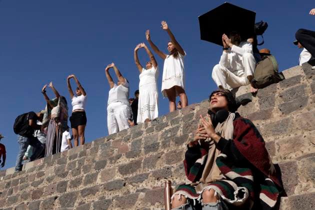 Mexico, tourists celebrate the equinox in the ruined metropolis of Teotihuacan