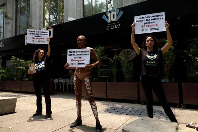 Mexico, protest against meat consumption in front of a restaurant in Mexico City