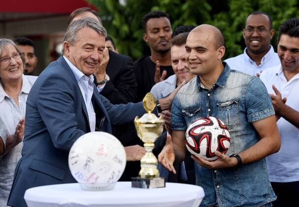Football match SG Egelsbach Refugees United against DFB company team