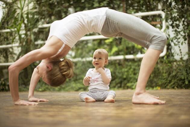 Model Released: Young Mother Does Yoga