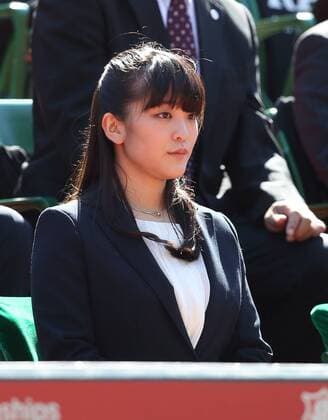 Princess Kiko and Prince Akishinomiya playing tennis in Tokyo