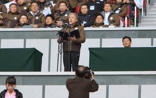 Korea: Workers from North and South play football
