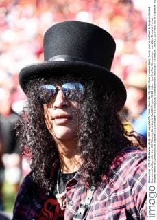 Slash plays the US national anthem at a football game in Los Angeles