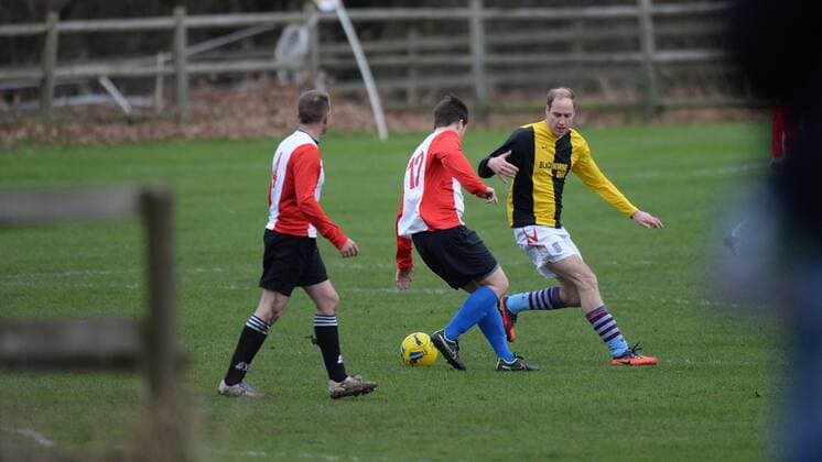 Prince William and Prince Harry play football