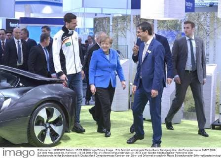 Angela Merkel meets handball player Erik Schmidt at the Cebit