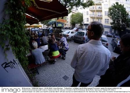 Football fans watch the European Championship opening match in Berlin