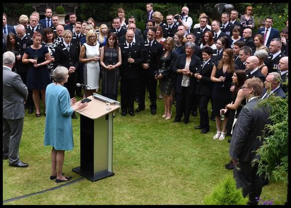 Prime Minister May receiving the Police Bravery Award