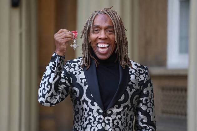 Celebrities after award ceremony in front of Buckingham Palace