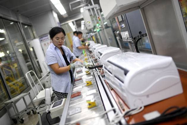 Heatwaves in Europe; air-conditioning units from China become a hit export; archive images
