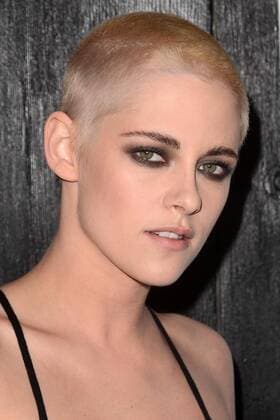 Kristen Stewart with blond short hair at film premiere Personal Shopper in LA