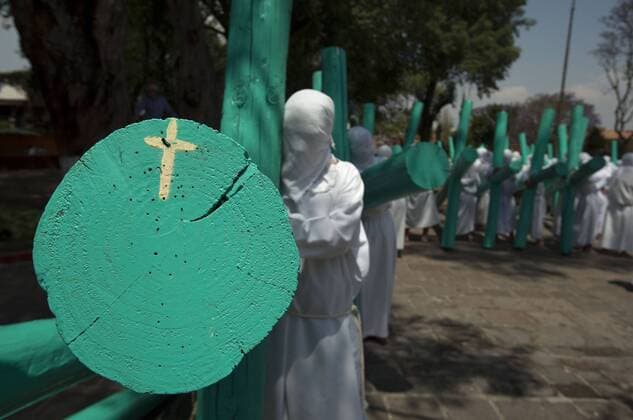 Good Friday procession with masquerade in Mexico