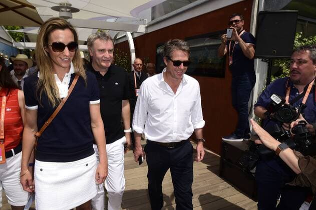 Hugh Grant visits the Tennis French Open in Paris