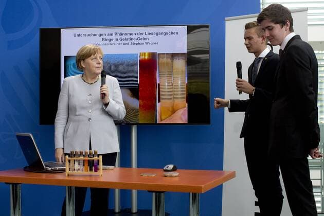Angela Merkel receives award winner from Jugend forscht