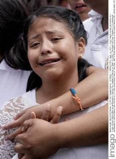 Earthquake in Mexico: Burial of a child