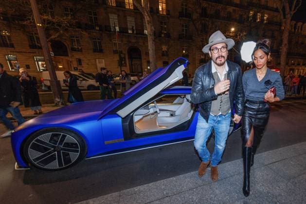Paris Fashion Week, Zoe Saldana and Marco Perego in the Jaguar Type 00