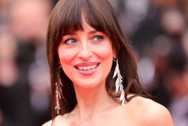 Dakota Johnson plays Marilyn Monroe in the short film *Flesh Impact*, archive footage