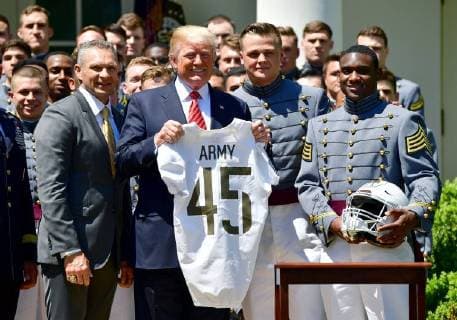 Donald Trump Receives Football Military Team