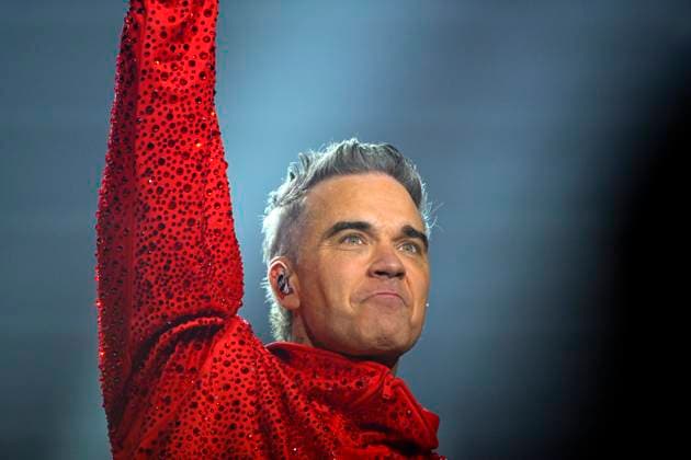Robbie Williams goes public with his autism diagnosis, archive photos