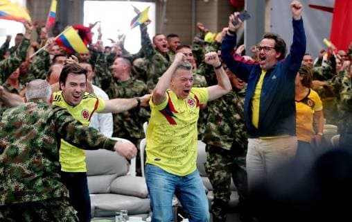 Colombia, President Juan Manuel Santos watches football World Cup with soldiers in Tolima