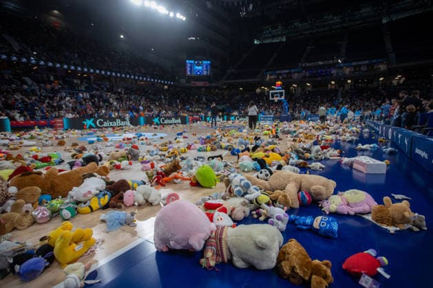 Spain, toy collection for Madrina Foundation at basketball game in Madrid