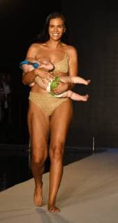 Model breastfeeds on catwalk at Sports Illustrated Swimsuit Show in Miami