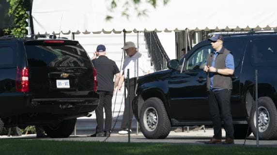 Donald Trump on his way to the golf course