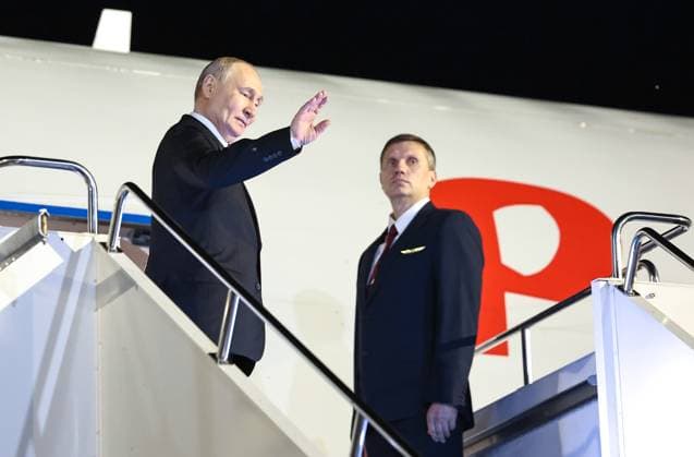Kazakhstan, Vladimir Putin waves as he takes off from Astana airport