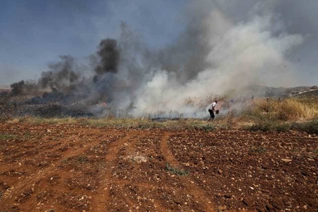 Middle East conflict, West Bank, Settlers set fire to Palestinian farmland