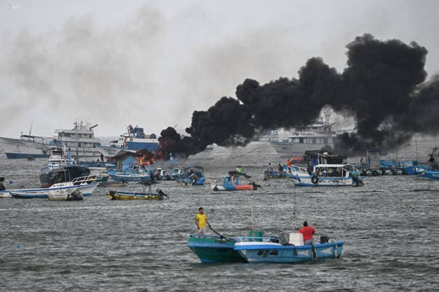 Ecuador, ships on fire in the harbour of Manta